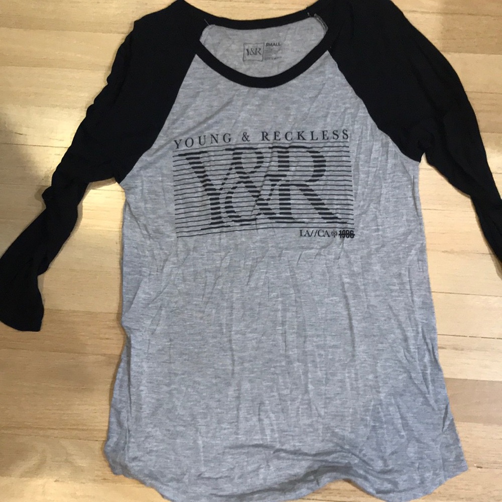 - Young in reckless T-shirt
